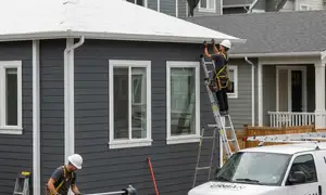 Gutter installation for dense Brooklyn, NY neighborhoods by vinyl siding professionals